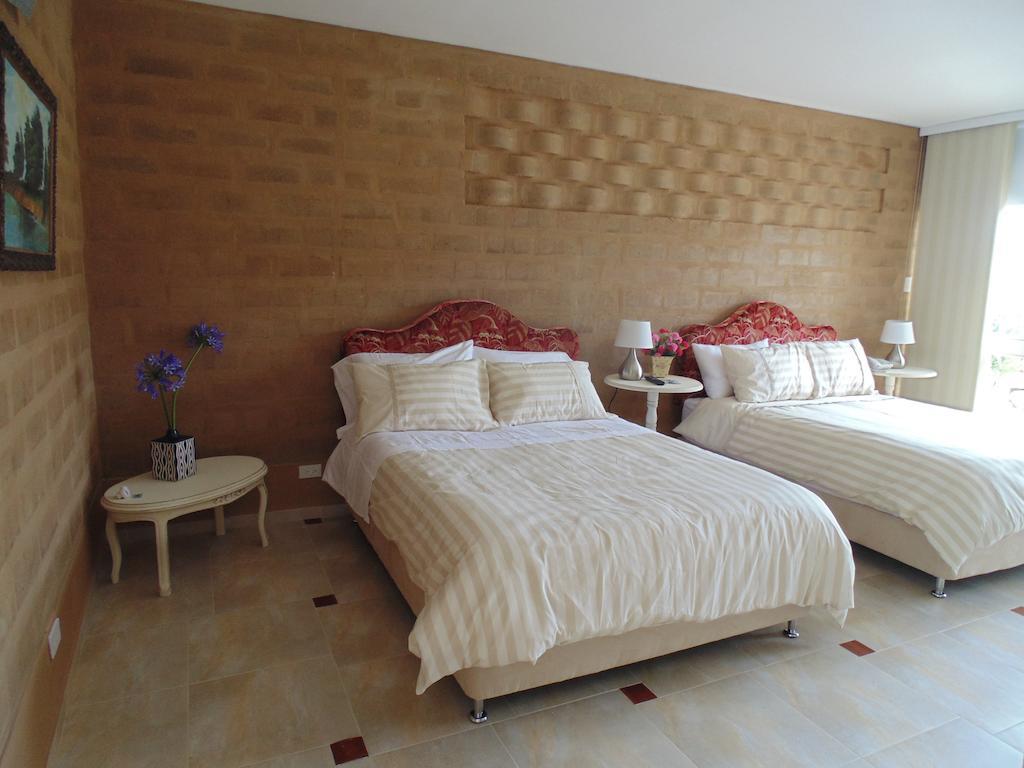 Bella Tierra Hotel Boutique تيباسوسا الغرفة الصورة